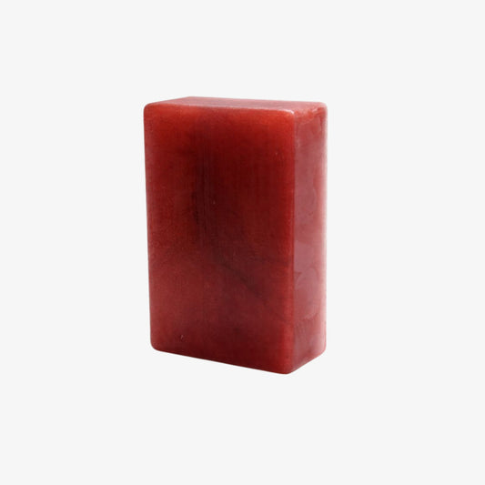 Cashmere Noir red rectangular bar of soap on a white background