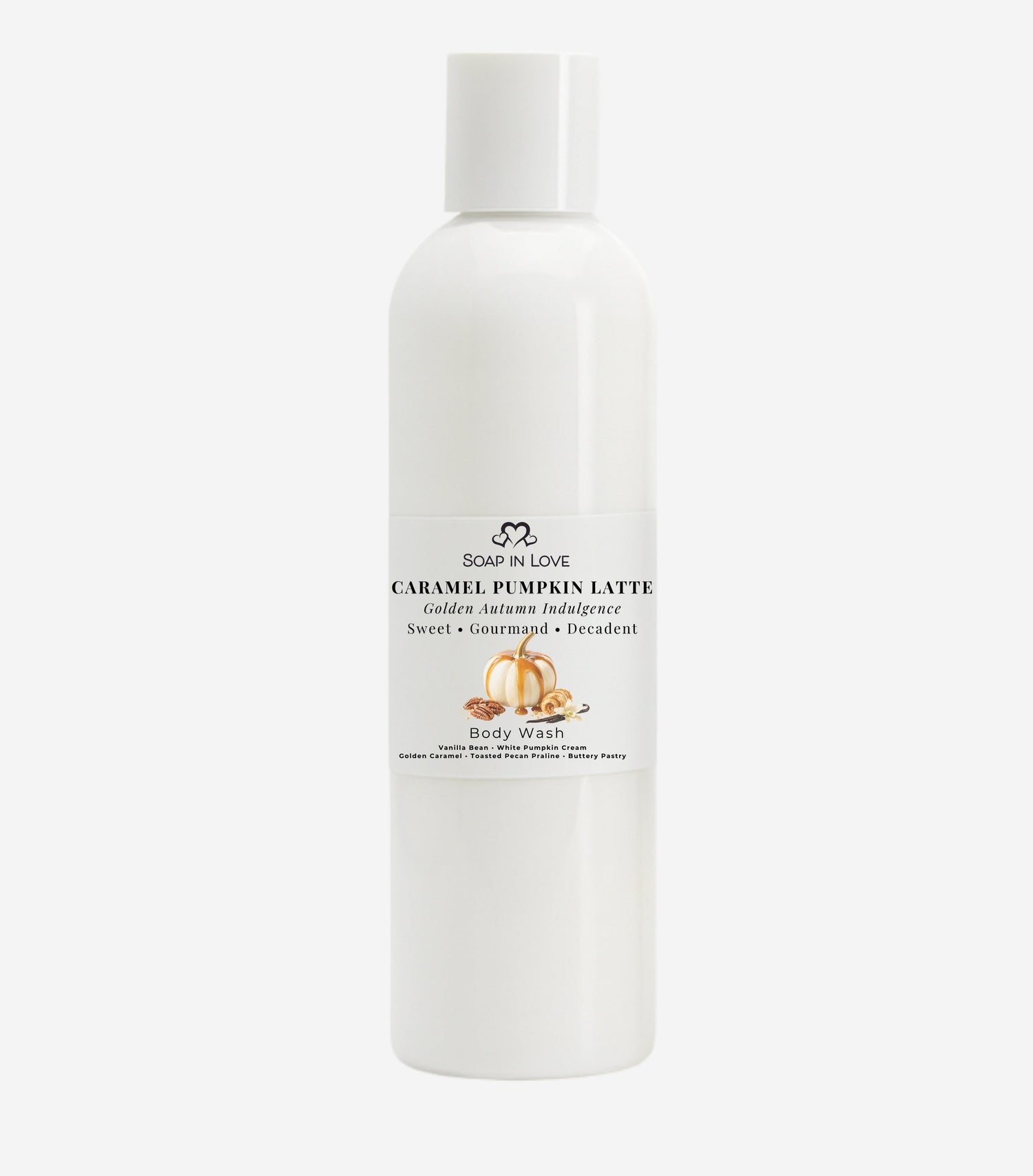 A white bottle of Soap In Love Caramel Pumpkin Latte body soap, featuring a minimalist white label with black text and a small pumpkin illustration, set against a solid light gray background.